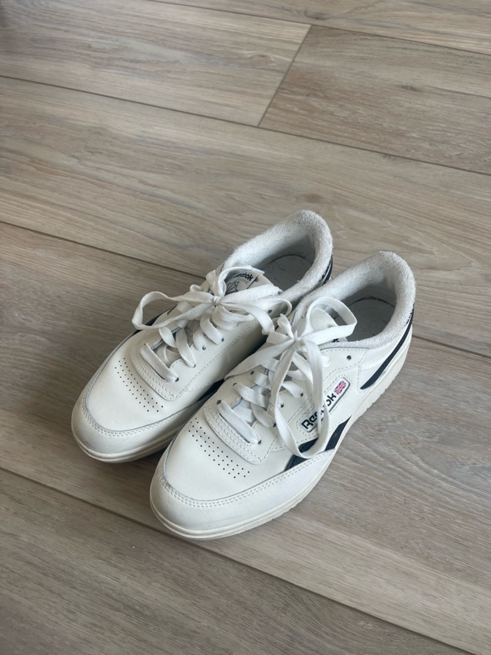 Reebok White Sneakers with Navy Stripe